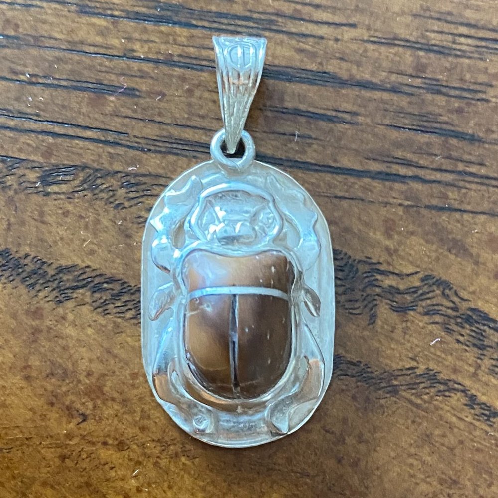 Sliver Scarab Amulet with Symbols from Ancient Egypt